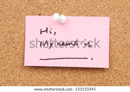 Note paper pinned on cork board which written \
