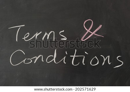 Terms and conditions words on blackboard