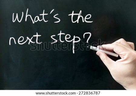 What\'s the next step words written on the blackboard using chalk