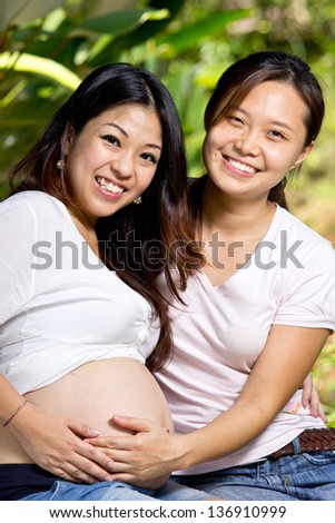 Wonderful pregnant woman with white background