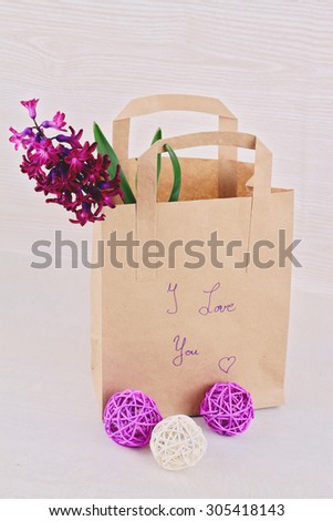 Gift bag with flowers and words I love you