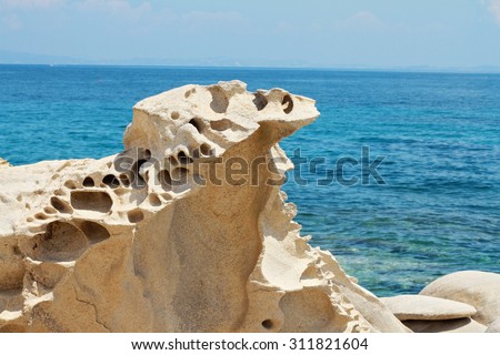 Rocks, stones, sea, horizon, blue sea and sky. Idyllic place for vacation. Summer holiday, postcard background