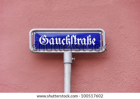 Street sign Gauckstrasse street - A street sign Gauckstrasse street, named like the 11th Federal President of Germany, Joachim Gauck, seen in Freiburg, Black Forest, Germany.