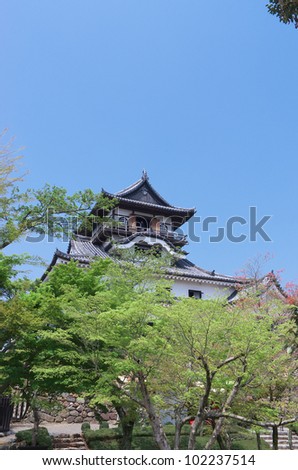 INUYAMA,JAPAN -APRIL 24 : Inuyama Castle and various plants on April 24, 2012 in Inuyama, Aichi, Japan.The castle is national treasure of Japan, built in 1469.