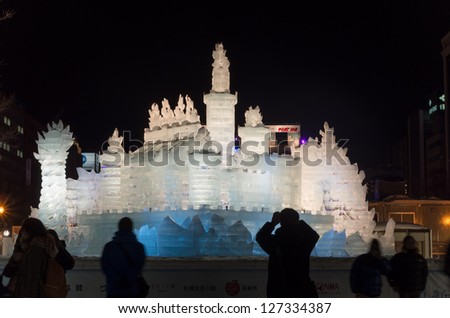 SAPPORO, JAPAN - FEB. 6 : Illuminated ice sculpture of an imaginary castle at Sapporo Snow Festival on February 6, 2013 in Sapporo, Hokkaido, japan.The Festival is held annually at Sapporo Odori Park.