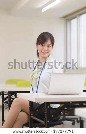 young business woman working in office room.