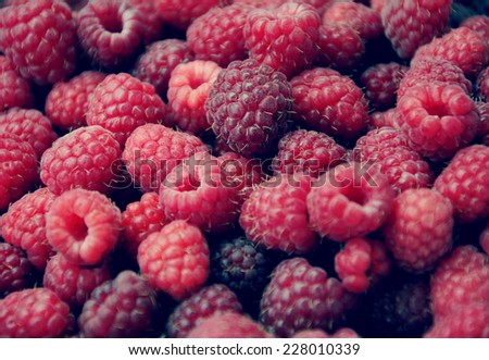 Background with sweet ripe red raspberries