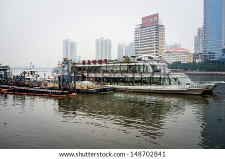 GUANGZHOU, CHINA - MARCH 24: An alternative to travel in Guangzhou is to cruise the Pearl river on the ferry on March 24, 2013 in Guangzhou, China.