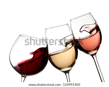 Red, white and rose wine glasses up