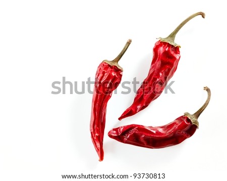 Three dry red chilly peppers