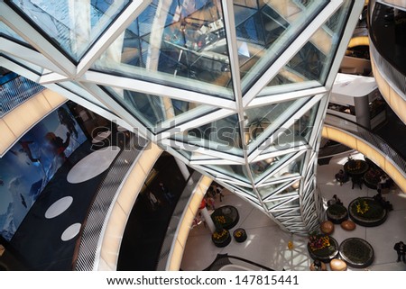 FRANKFURT, GERMANY - JUNE 29: inside view of the shopping mall MyZeil on June 29, 2013 in Frankfurt. MyZeil is a famous mall from architect Massimiliano Fuksas with the longest escalator in Germany.