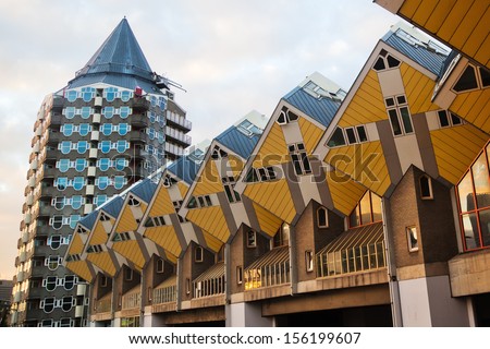 ROTTERDAM, NETHERLANDS - SEPTEMBER 20: cubic houses and Blaaktower on September 20, 2013 in Rotterdam. The famous futuristic home buildings and also the Blaaktower are from architect Piet Blom.