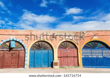 picturesque doors of artist shops in the old town of Essaouira, Morocco, which is completely under the protection of the UNESCO world heritage