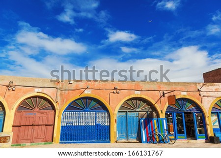 ESSAOUIRA, MOROCCO - NOVEMBER 18: doors of artists shops on November 18, 2013 in Essaouira. The old town of Essaouira is completely protected by the UNESCO world heritage.