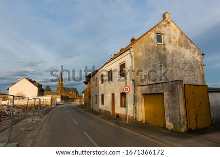 Similar – Image, Stock Photo church in Manheim, a village that is being demolished for open-cast lignite mining, view through a hole in a brick wall