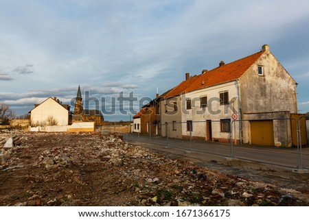 Similar – Image, Stock Photo church in Manheim, a village that is being demolished for open-cast lignite mining, view through a hole in a brick wall