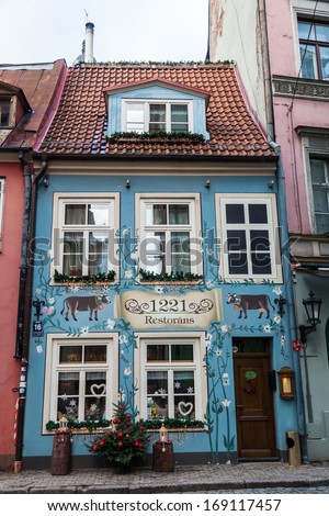 RIGA, LATVIA - DECEMBER 13: old restaurant in the old town on December 13, 2013 in Riga. The old town of Riga is listed under the UNESCO world heritage sites.
