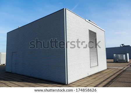 corrugated iron structure with air outlet