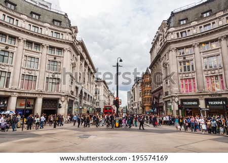 LONDON - MAY 20: Oxford Circus with unidentified people on May 20, 2014 in London. Up to over 40.000 pedestrians per hour pass the junction, it is the highest pedestrian volumes recorded in London.