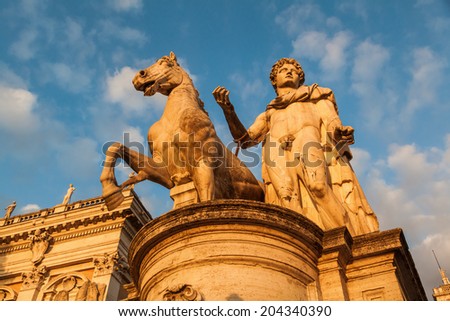 statue at the the Piazza del Campidoglio in Rome with evening sun
