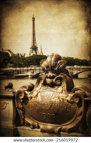 vintage style picture of a view from the Pont Alexandre III over the Seine to the Tour Eiffel in Paris, France