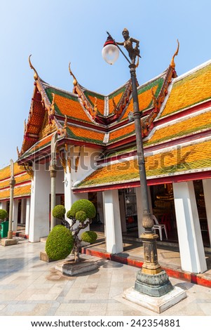 BANGKOK, THAILAND - DECEMBER 12, 2014: temple Wat Suthat that is a royal temple of first grade, one of ten such temples in Bangkok -23 in Thailand-. Construction was begun by King Rama I in 1807