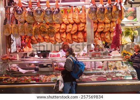 VALENCIA, SPAIN - FEBRUARY 10, 2015: market hall Mercado Central with unidentified people. Built in architectural style of Modernisme its considered one of the oldest European markets still running