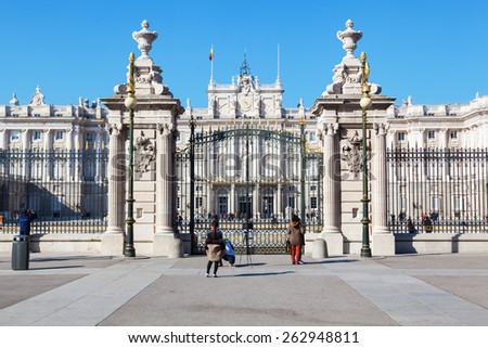 MADRID, SPAIN - MARCH 16, 2015: The Royal Palace of Madrid with unidentified people. Its the official residence of the Spanish Royal Family at the city of Madrid, but is only used for state ceremonies