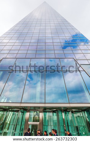 MADRID, SPAIN - MARCH 17, 2015: Torre de Cristal in the Four Towers Business Area with unidentified people. The four towers are the tallest skyscrapers in Madrid and Spain