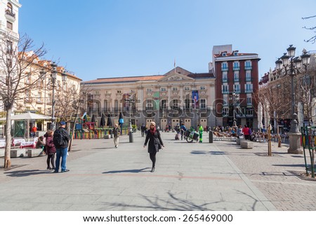 MADRID, SPAIN - MARCH 16, 2015: Plaza de Santa Ana features monuments to Spanish Golden Age writer Pedro Calderon de la Barca and the poet Federico Garcia Lorca and lot of restaurants, cafes and bars