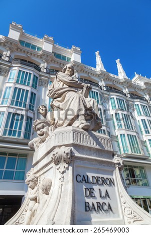 MADRID, SPAIN - MARCH 16, 2015: Plaza de Santa Ana features monument of the Spanish Golden Age writer Pedro Calderon de la Barca and lot of restaurants, cafes and bars