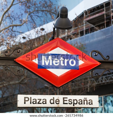 MADRID, SPAIN - MARCH 16, 2015: Metro sign at the Plaza de Espana in Madrid, Spain. With 296 km metro network the Madrid metro is the 5th longest Metro of the world.