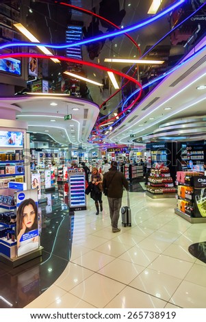 MADRID, SPAIN-MARCH 18, 2015: Duty free shop with unidentified people at Madrid-Barajas Airport, the main international airport serving Madrid, with about 39 million passengers Europes 6th the busiest