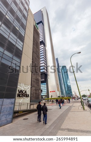 MADRID, SPAIN - MARCH 17, 2015: Cuatro Torres Business Area with unidentified people. They are the tallest skyscrapers in Madrid and Spain