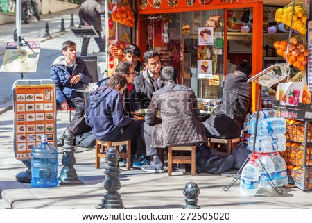 ISTANBUL, TURKEY - APRIL 10, 2015: traditinal street restaurant in the old town of Istanbul with unidentified people. Istanbul is the largest city in Turkey and a famous travel destination