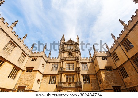 OXFORD, ENGLAND - JULY 03, 2015: wide angle view in the courtyard of Bodleian Library. Its one of oldest libraries in Europe with over 11 mio items and also film location for Harry Potter and others