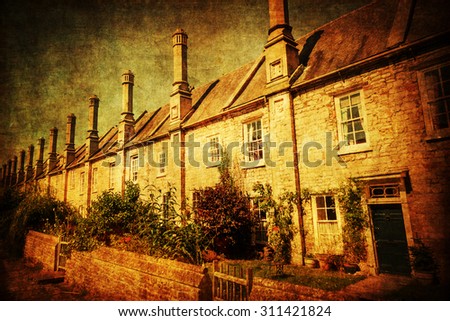 vintage style picture of old row buildings at Vicars Close in Wells, England