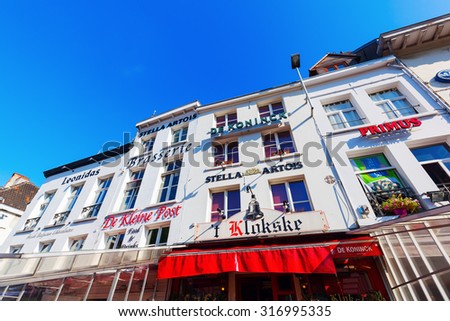 ANTWERP, BELGIUM - SEPTEMBER 03, 2015: buildings of restaurants with beer names in the old town of Antwerp. Antwerp is the capital of Antwerp province and with 510610 most populous city in Belgium