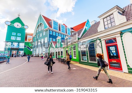 ZAANDAM, NETHERLANDS - SEPTEMBER 02, 2015: unique buildings in Zaandam with unidentified people. This buildings beside the Inntel Hotels are designed by WAM architects.