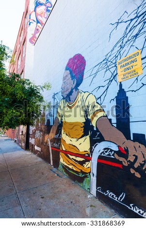 NEW YORK CITY - OCTOBER 10, 2015: mural art in Bushwick, Brooklyn. Bushwick is one of NYCs major street art hubs, with an outdoor art gallery known as the Bushwick Collective
