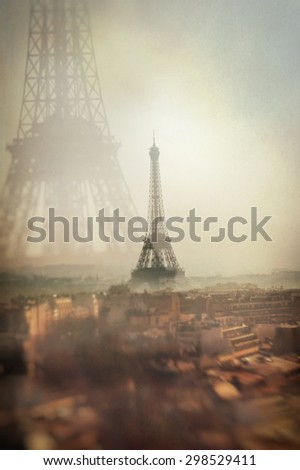 Textured image of the Eiffel Tower with double exposure, color and light effects