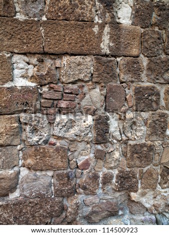 High definition photograph of a ancient worn wall in Italy shot in medium format Hasselblad and Phase One digital for maximum quality. Tuscan wall in a background image