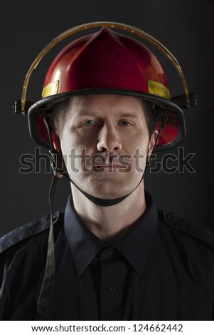 Half body portrait of a fireman a wearing helmet