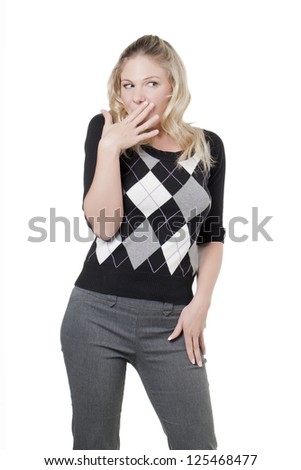 Woman trying to cover her mouth to hide her sarcastic smile