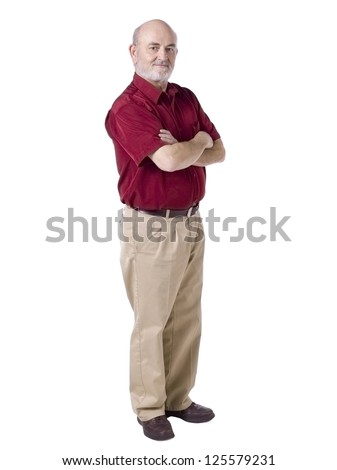 Portrait of old man standing while in cross arms against white background