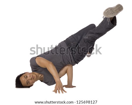 Close-up image of male break dancing against a white background