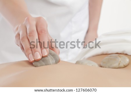 Image of woman having stone massage