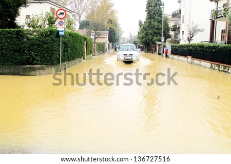 cars in the streets and roads submerged by the mud of the flood after the flooding of the River 11