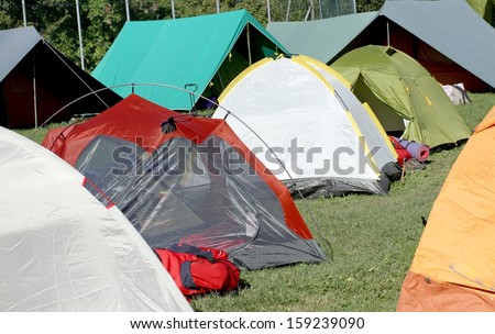 series of tents where they sleep the kids and people sheltered from weather