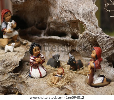 Classic Nativity scene with Jesus, Joseph and Mary in a manger on Christmas 1